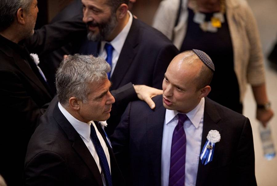Yair Lapid and Naftali Bennett at the 19th Knesset Swearing-In Ceremony(EPA/URIEL SINAI / POOL)