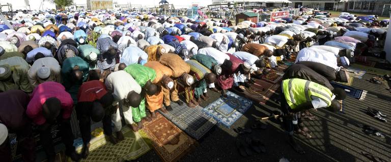 Muslims take part in Eid Al-Adha prayer at the Syrian Mosque in Lagos, Nigeria, on October 4, 2014. (Pius Utomi Ekpei/AFP/Getty Images)