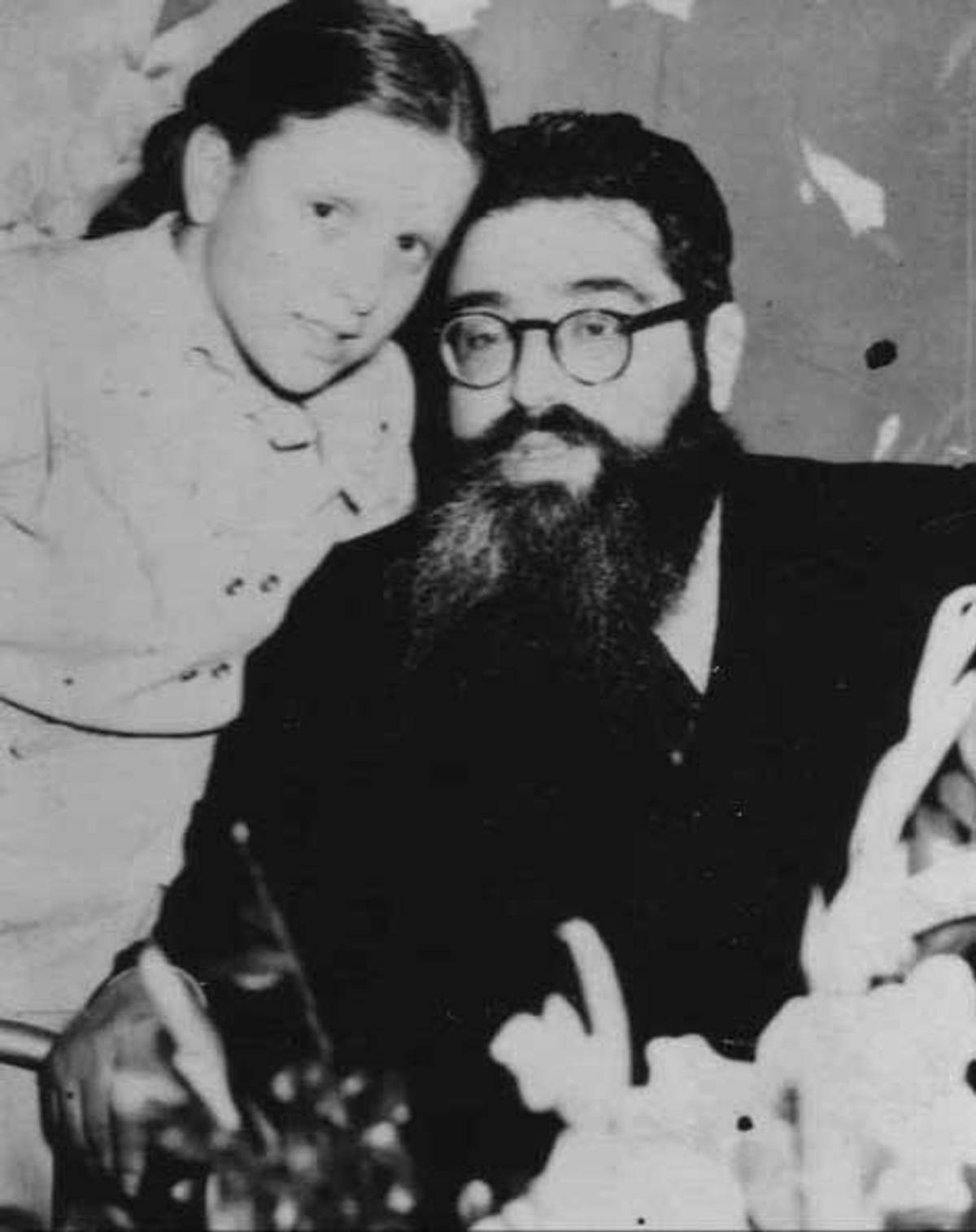 Bruria Hutner David as a child, pictured with her father, Rabbi Yitzchak Hutner, circa 1950