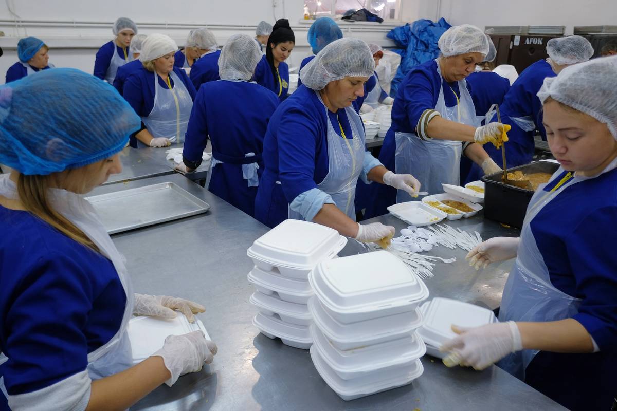 Ukrainian women prepare meals that are served for free before Rosh Hashanah, in 2018. Fifteen thousand meals were served, twice a day.