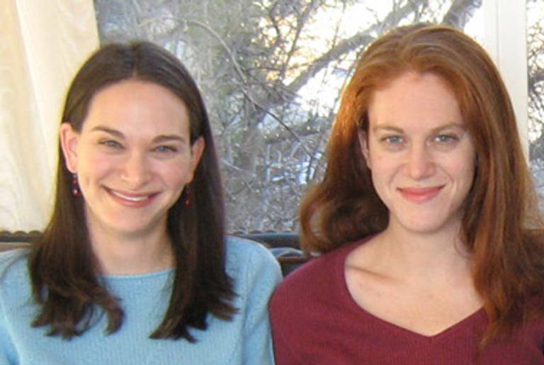 Sarah (left) and Bekah Wolf celebrate Christmas at their uncle’s house in Albuquerque in 2006.(Carolyn Wolf)