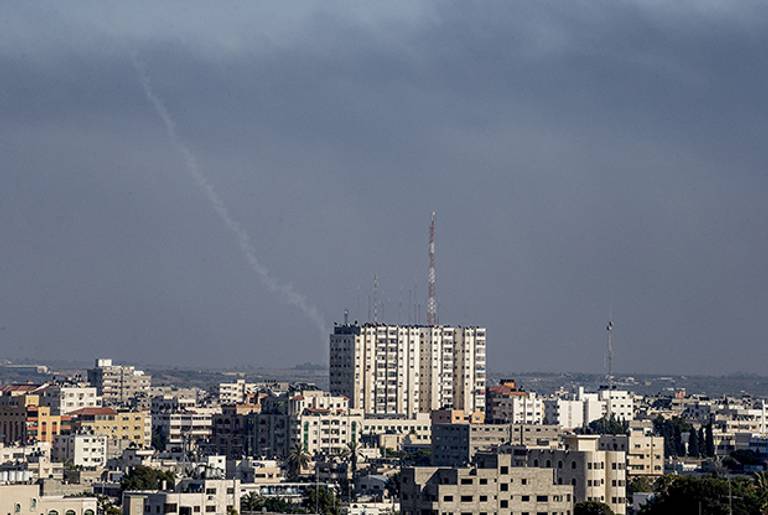 The trail of a rocket launched by Palestinian militants into Israel is seen from an area East of Gaza City on July 21, 2014. (MARCO LONGARI/AFP/Getty Images)