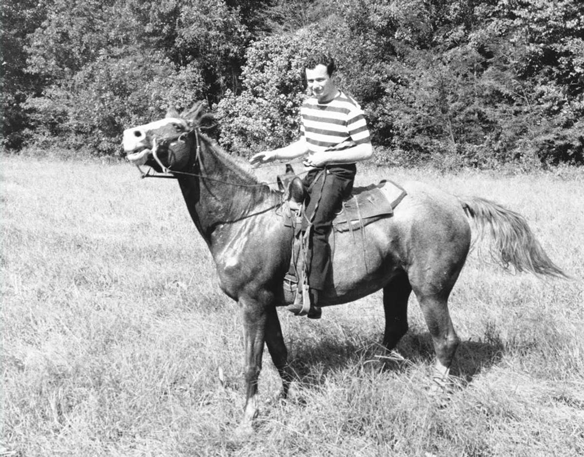 Brian Epstein goes riding on his birthday in 1964 in Alton, Missouri. (Photo: Curt Gunther-Steven Gunther Estate)