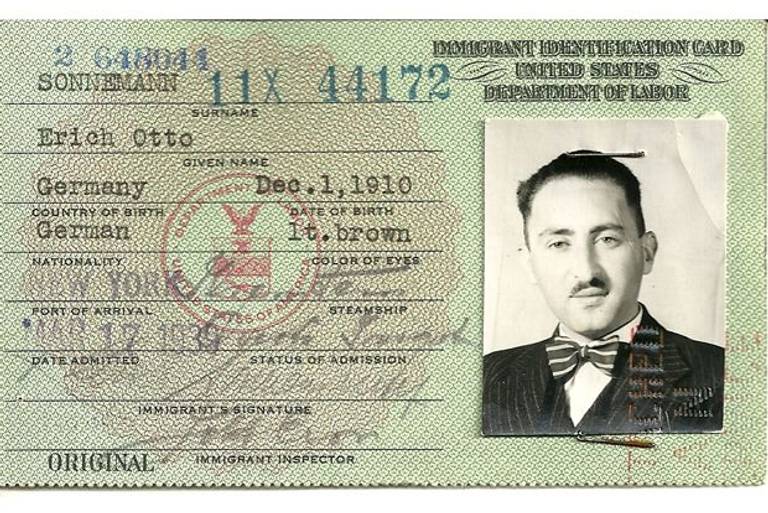 The author's father's immigrant identification card issued March 17, 1939. 