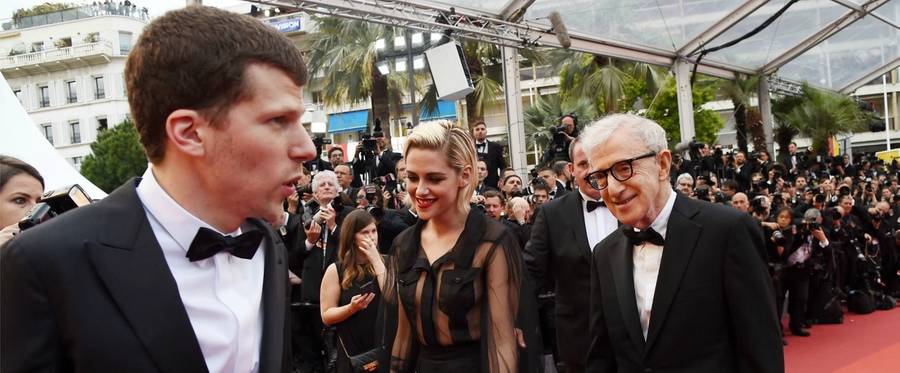 Woody Allen (R) with actors Jesse Eisenberg (L) and Kristen Stewart at the screening of the film 'Cafe Society' during the opening ceremony of the 69th Cannes Film Festival in Cannes, southern France, May 11, 2016. 