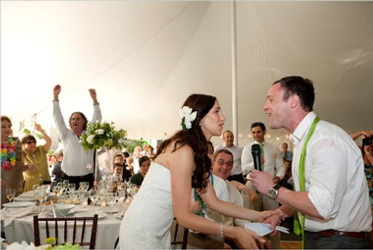 The groom serenades the bride.(Kelly Shimoda/NYT)