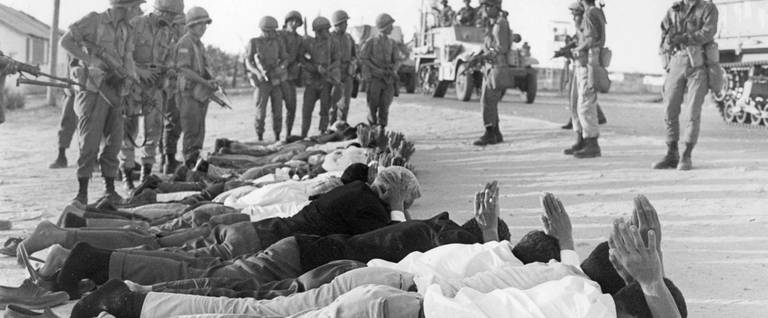 Palestinians surrender to Israeli soldiers in June 1967 in the occupied territory of the West Bank.