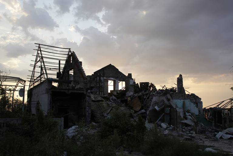 A picture shows a house destroyed by combat between the Ukrainian armed forces and pro-Russian militants, in the village of Senyonovka, near the eastern Ukrainian city of Slavyansk, on August 7, 2014. (ANATOLII STEPANOV/AFP/Getty Images)