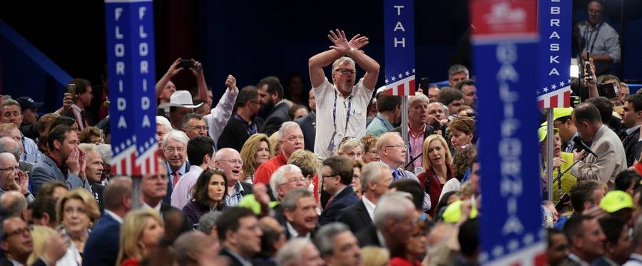 Delegates protest on the floor on the first day of the Republican National Convention at the Quicken Loans Arena in Cleveland, Ohio, July 18, 2016. 