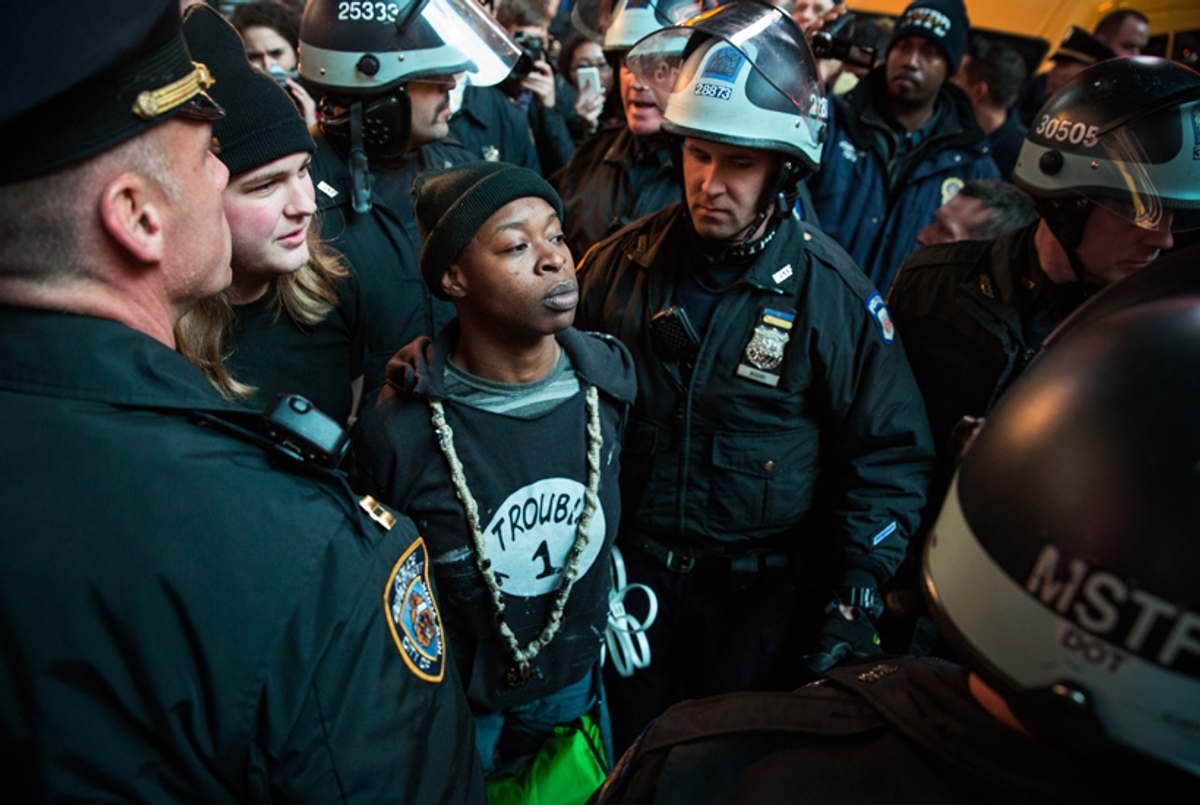 A man is arrested in Times Square by police for obstructing traffic while protesting the Ferguson grand jury decision to not indict officer Darren Wilson in the Michael Brown case.(Getty Images)