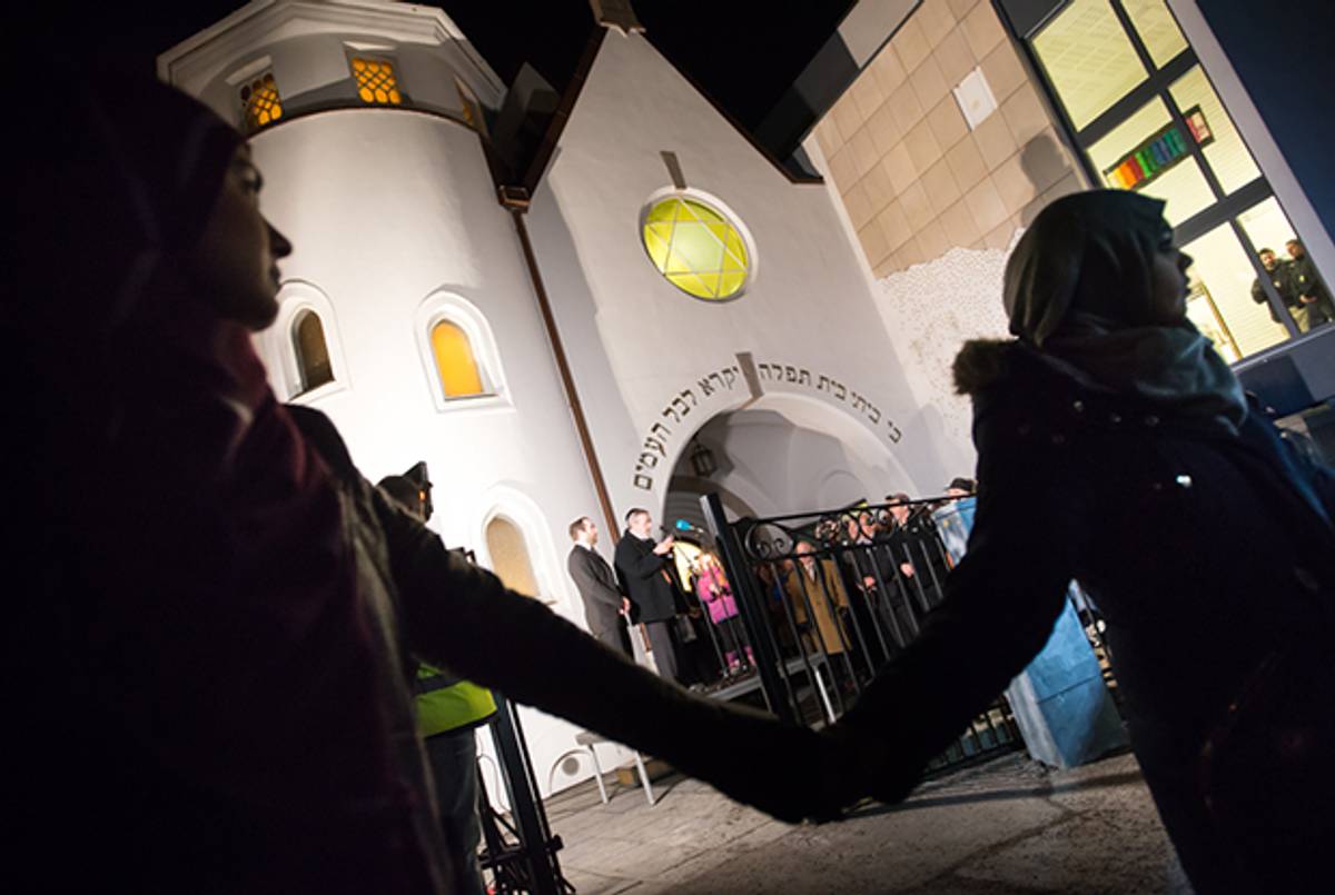 Rabbi Michael Melchior speaks to those assembled in front of the Oslo Synagogue during the Ring of Peace vigil. (Ryan Rodrick Beiler)