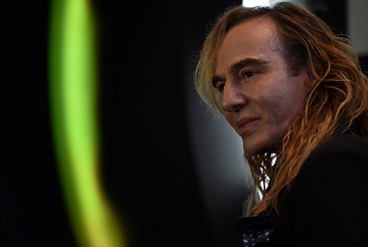 British designer John Galliano gives a press conference on his new work as a consultant for Russian cosmetics retailer L'Etoile in at the Barvikha Luxury Village Concert Hall just outside Moscow, on May 22, 2014. (KIRILL KUDRYAVTSEV/AFP/Getty Images)