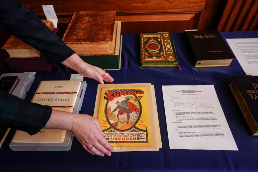 A first edition Superman comic from 1939 is placed with copies of the Constitution and a variety of holy books for use in the swearing-in ceremonies of new House members, at the Capitol in Washington on opening day of the 118th Congress, Jan. 3, 2023 