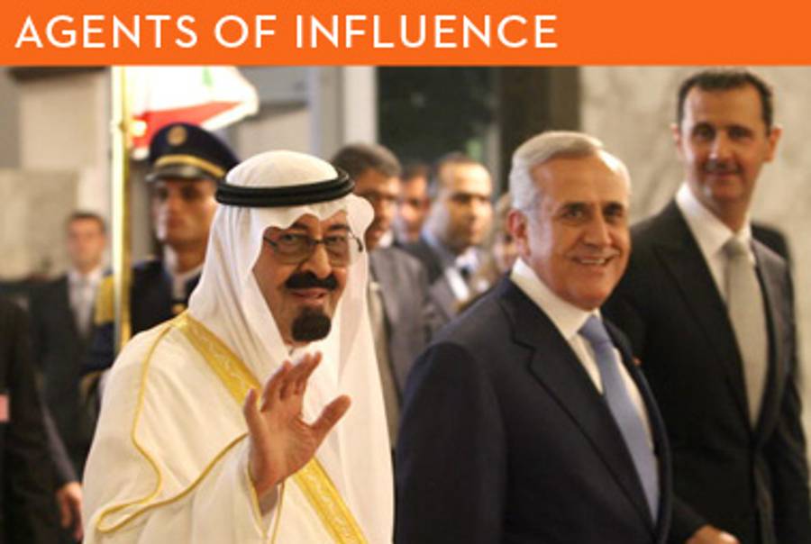 Saudi Arabia’s King Abdullah, Lebanese President Michel Sleiman, and Syrian President Bashar al-Assad arrive for a summit meeting near Beirut in July, 2010.(STR/AFP/Getty Images)