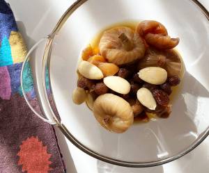 Dried fruit compote with almonds, rosewater, and star anise 