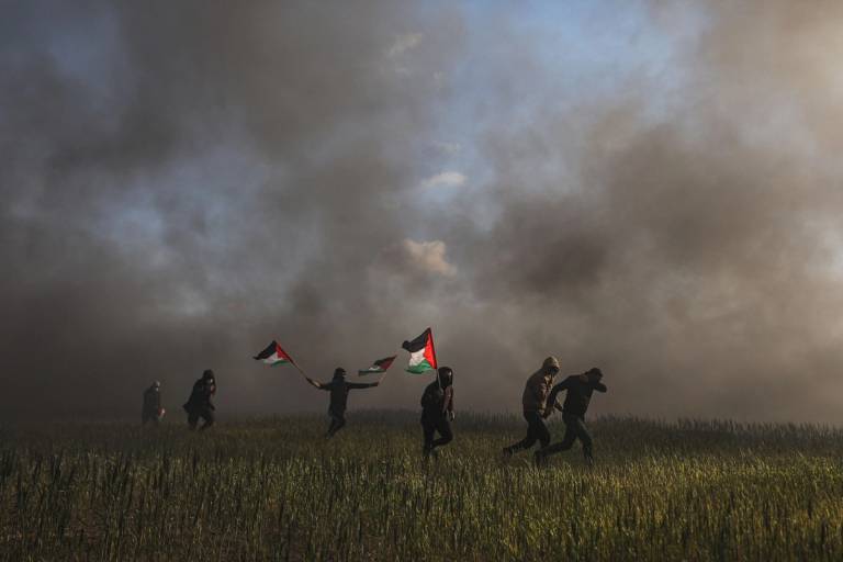 Palestinians gather on the Israeli border in Gaza City on Feb. 22, 2023