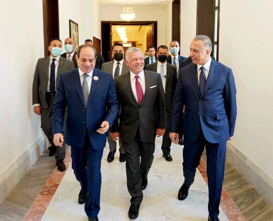 Iraqi Prime Minister Mustafa al-Kadhimi, at right; Egyptian President Abdel-Fattah el-Sissi, left; and King Abdullah II of Jordan, center, attend the ‘Tripartite Summit’ in Baghdad, on June 27, 2021 