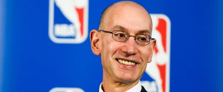 NBA Commissioner Adam Silver looks on during a press conference to announce a marketing partnership between the NBA and PepsiCo in New York City, April 13, 2015. 
