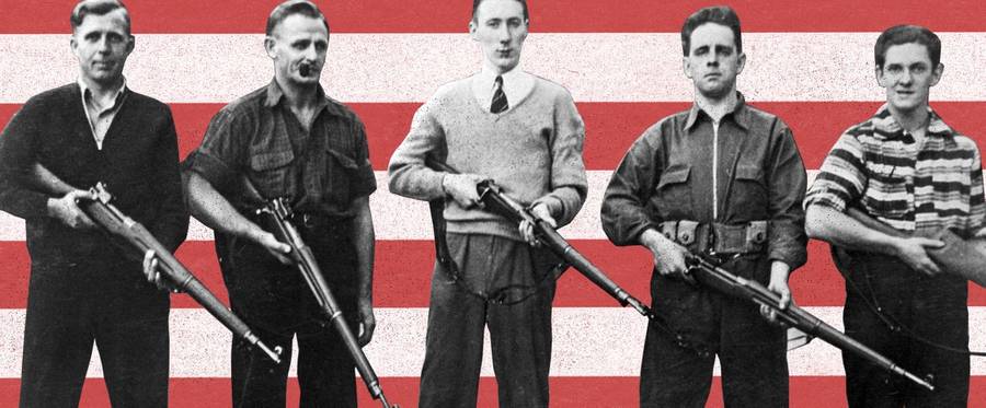 1940: Five members of the Christian Front, an anti-Semitic group, pose with their rifles. The photo was seized by the FBI when they were arrested for planning to overthrow the U.S. government.