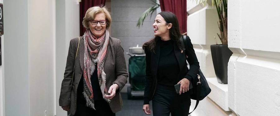 Alexandria Ocasio-Cortez, right, arrives with Rep. Chellie Pingree at a House Democratic Caucus meeting at the U.S. Capitol on Jan. 9, 2019, in Washington, D.C.