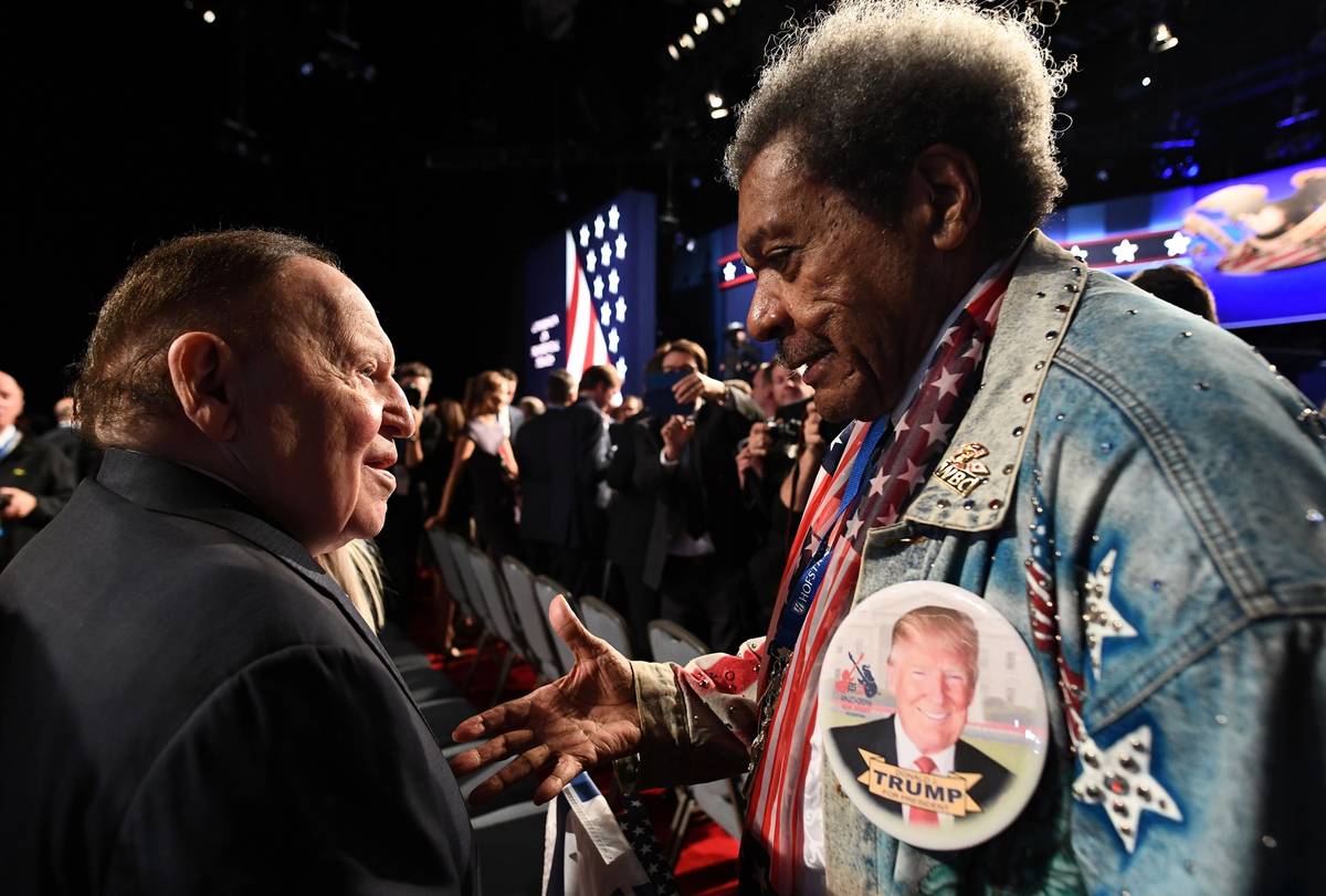 Don King (R) speaks with Sheldon Adelson before the first presidential debate at Hofstra University in Hempstead, New York on September 26, 2016. (JEWEL SAMAD/AFP/Getty Images)