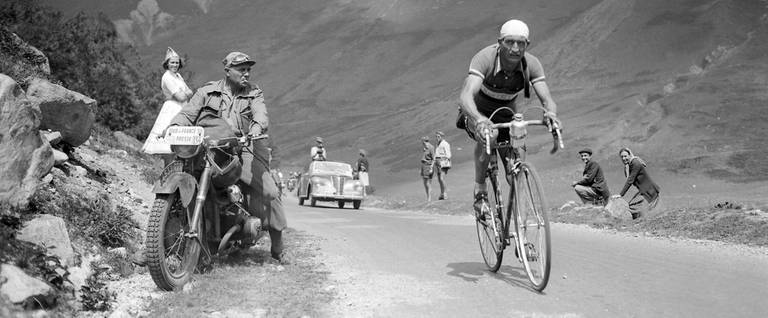 Gino Bartali rides uphill on July 25, 1950 in the Pyrenees mountains during the 11th stage of the Tour de France between Pau and Saint-Gaudens.