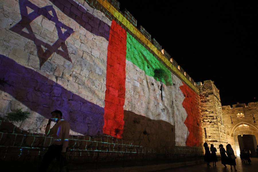 The flags of Israel, United Arab Emirates, and Bahrain are projected on the ramparts of Jerusalem’s Old City on Sept. 15, 2020, in a show of support for normalization deals between Israel and the two Arab countries