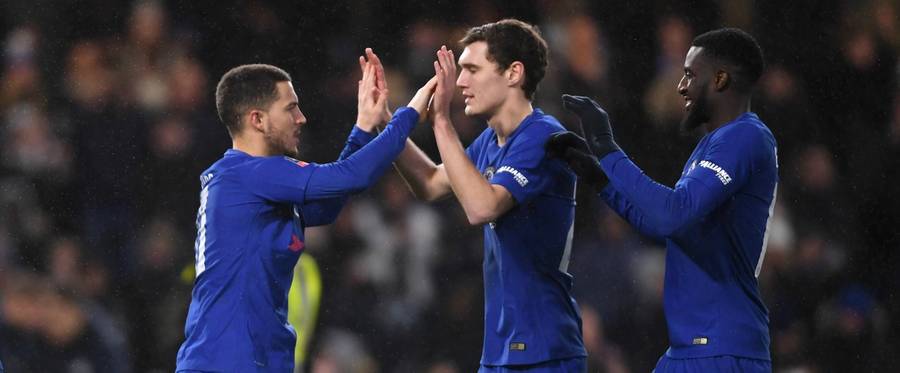 Eden Hazard (left) of Chelsea celebrates victory with teammates during The Emirates FA Cup Third Round Replay.