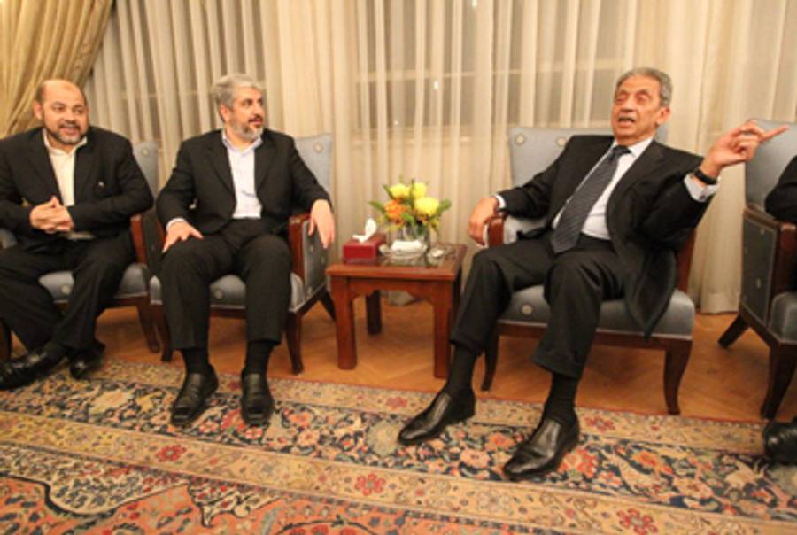 Amr Moussa (R) with Hamas’s leader and deputy leader.(Khaled Desouki/AFP/Getty Images)