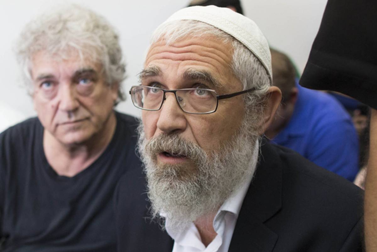 Rabbi Mordechai Elon, an leading figure in the religious Zionist community, waits for his sentence at the Magistrate court in Jerusalem, on August 7, 2013.(YONATAN SINDEL/AFP/Getty Images)