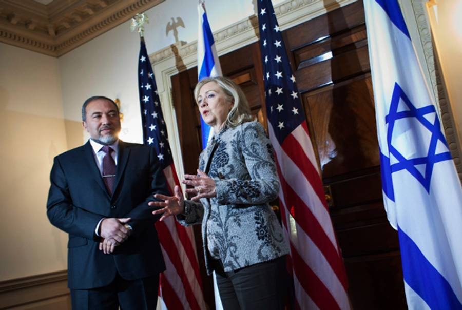 Avigdor Lieberman and Hillary Clinton February 7, 2012 in Washington, DC. (Brendan Smialowski/Getty Images)