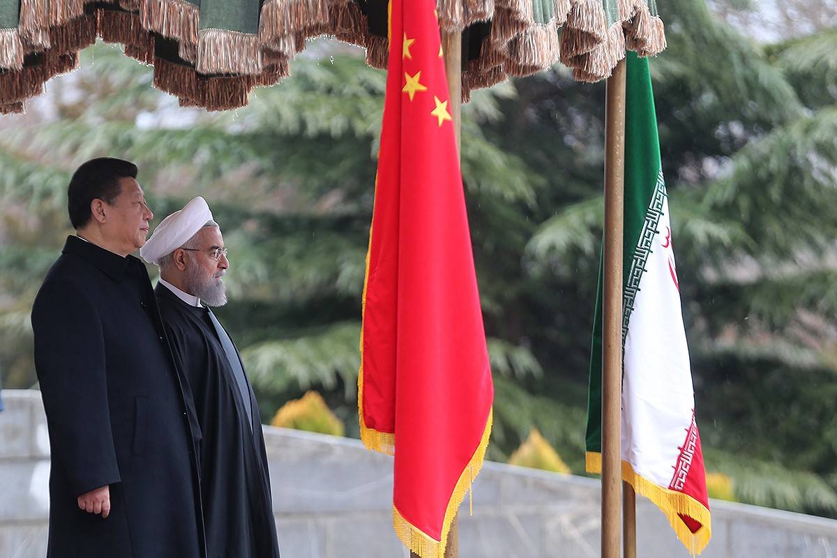 Chinese President Xi Jinping and then-Iranian President Hassan Rouhani during an official ceremony prior to their meeting at Saadabad Palace in Tehran, Iran, on Jan. 23, 2016
