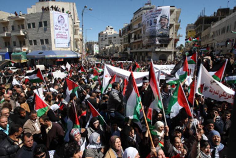 Pro-unity protesters today in Ramallah, the capital of the West Bank.(Abbas Momani/AFP/Getty Images)