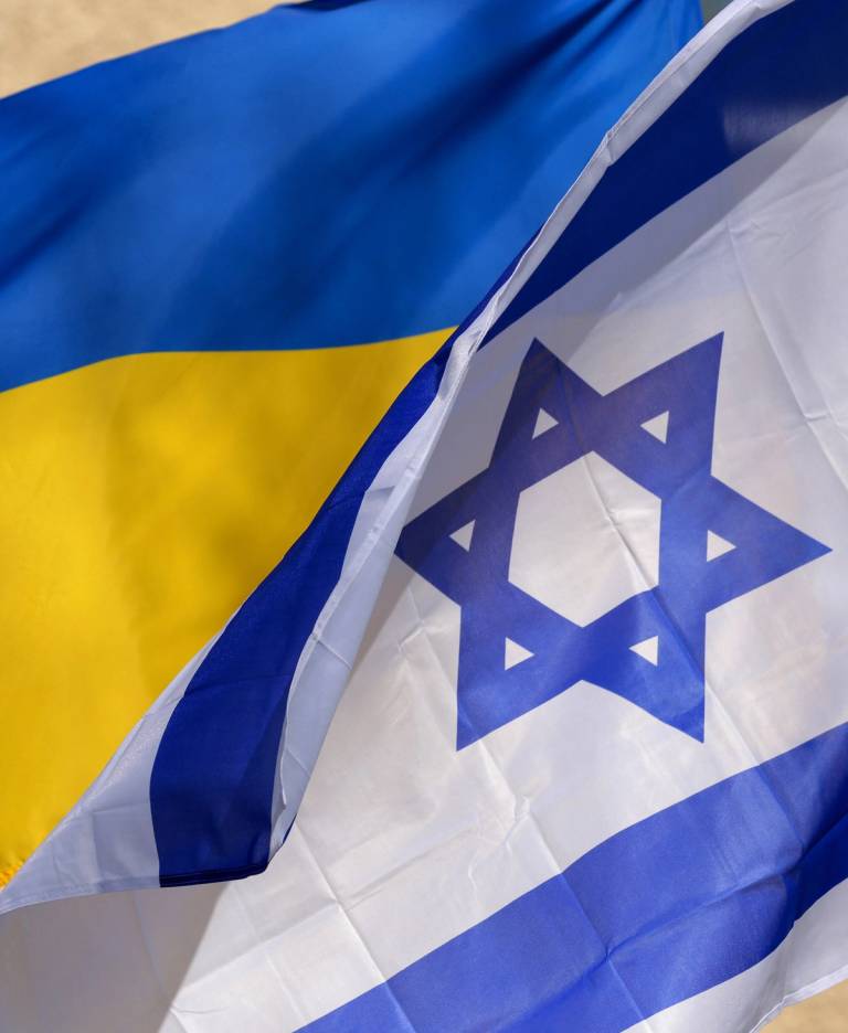 Ukrainian and Israeli flags are pictured during the opening of the Israeli field hospital in western Ukraine