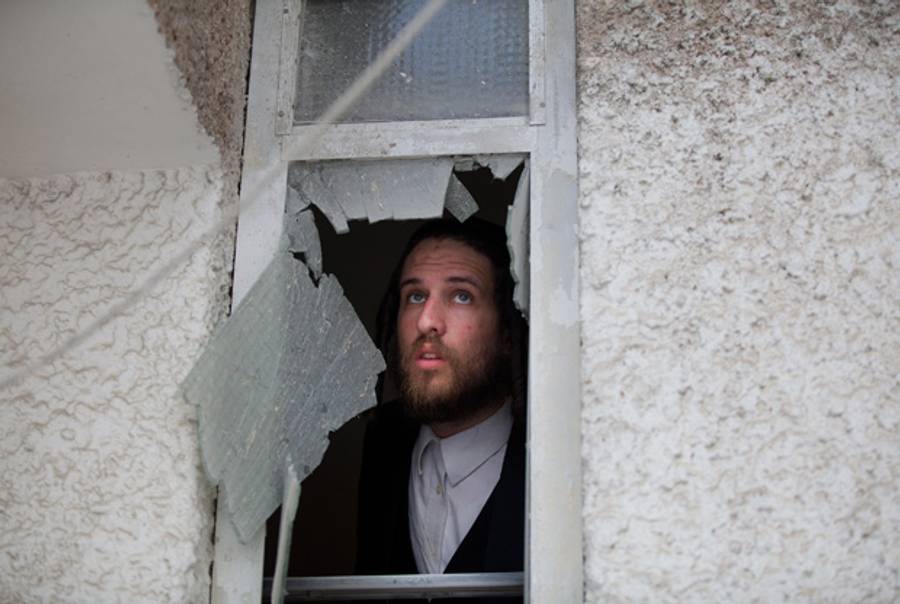 A man in Ashdod, Israel, after a rocket attack.(Uriel Sinai/Getty Images)