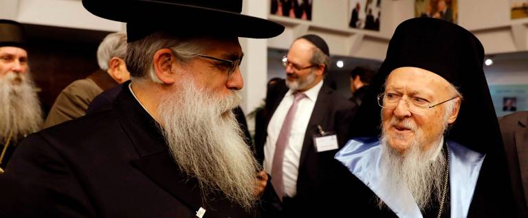 Ecumenical Patriarch of Constantinople Bartholomew I (right) speaks to Rabbi Yaakov Bleich (left) at Hebrew University in Jerusalem on Dec. 6, 2017. 