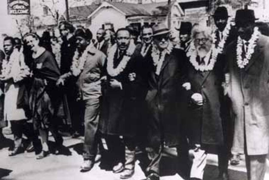 Martin Luther King (center) and Abraham Joshua Heschel (second from right) at the 1965 Selma march.(Wikipedia)