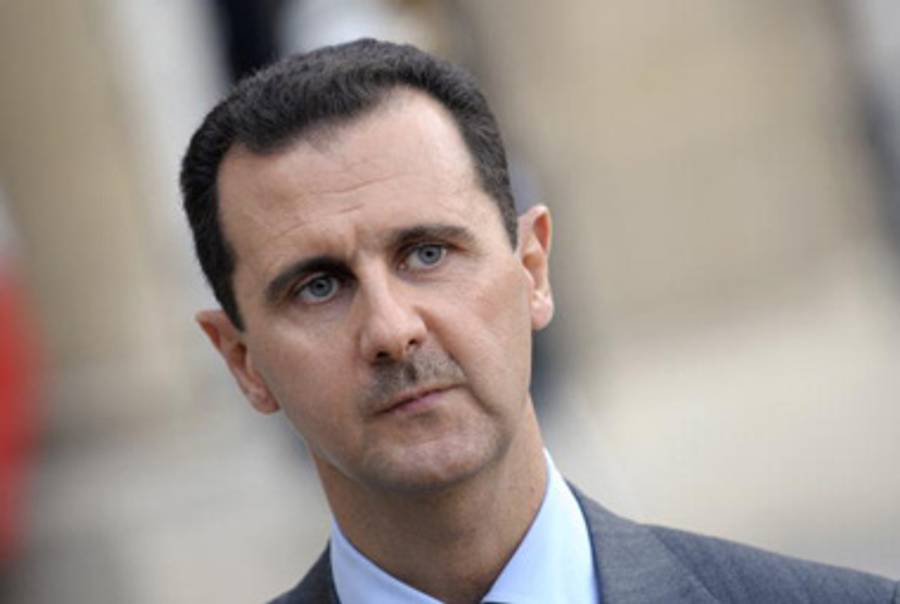 Assad in Paris last November.(Bertrand Guay/AFP/Getty Images)