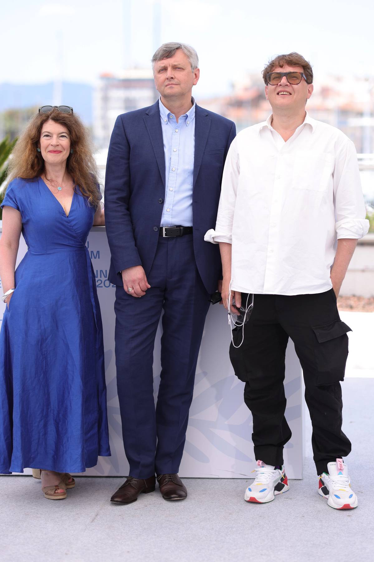 (L to R) Producer Maria Choustova, Director Sergei Loznitza and Producer Ilya Khrzhanovskiy attend the "Baby Yar. Context" photocall during the 74th annual Cannes Film Festival on July 11, 2021 in Cannes, France. 
