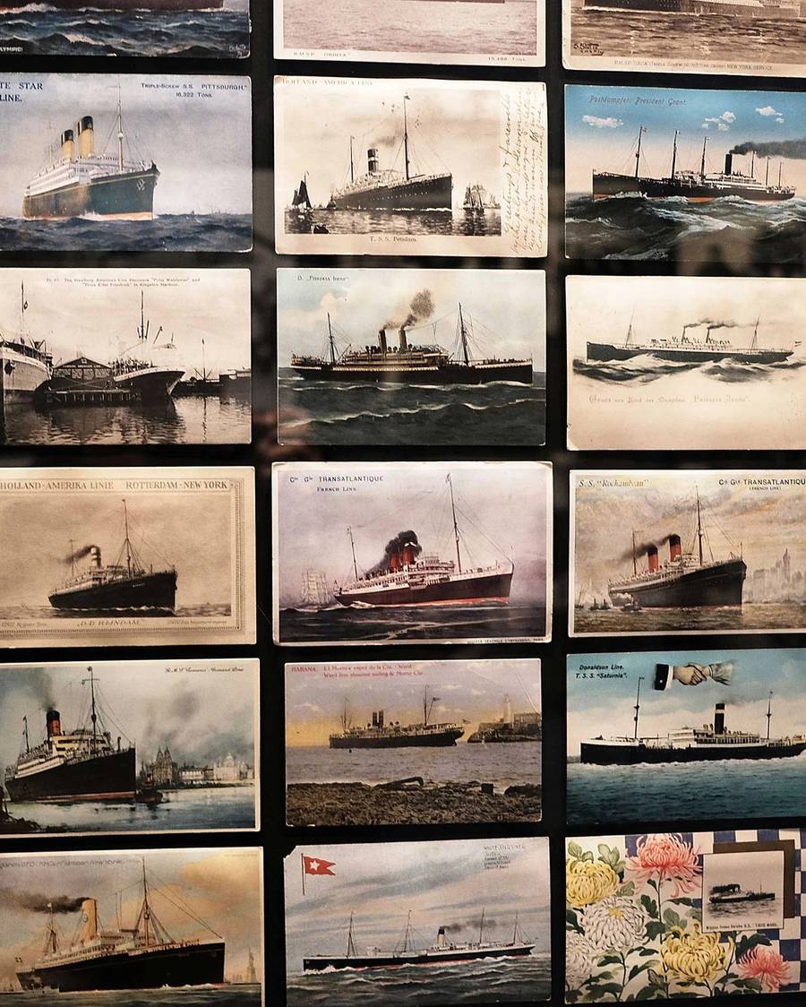 Drawings of some of the passenger ships used for passage to Ellis Island, a gateway for over 12 million immigrants to the United States, are displayed at a museum at Ellis Island in New York City. on Jan. 31, 2017