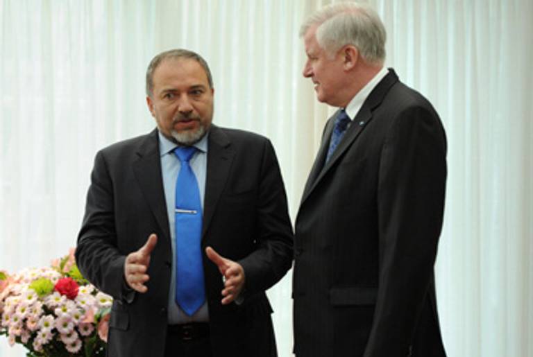 Avigdor Lieberman (L), sizing things up.(Christof Stache/AFP/Getty Images)