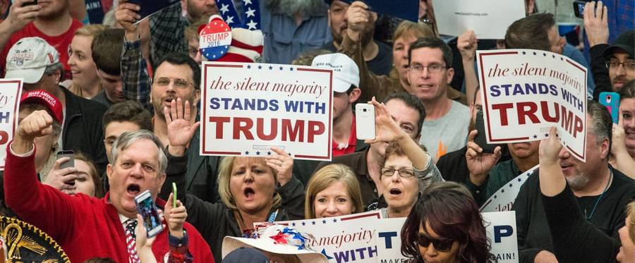 Donald Trump supporters cheer on the Republican presidential candidate before a campaign rally in Concord, North Carolina, March 7, 2016. 