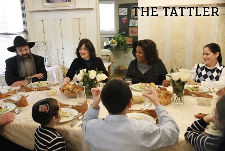 Oprah Winfrey joins the family for a traditional meal.(George Burns/Harpo, Inc.)