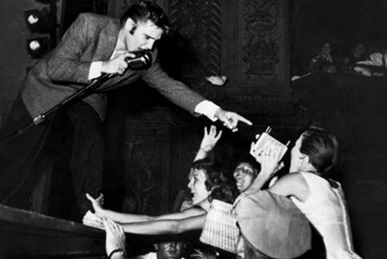 Elvis Presley singing "You Ain't Nothin' but a Hound Dog"(Don Wright/Time & Life Pictures/Getty ImagesDon Wright/Time & Life Pictures/Getty Images)