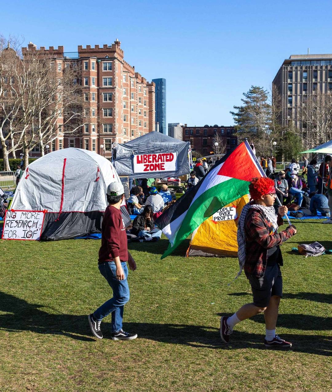 Students from Massachusetts Institute of Technology, Harvard University, and others rally at a protest encampment by the Scientists Against Genocide on MIT's Kresge Lawn in Cambridge, Massachusetts, on April 22, 2024
