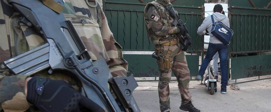 Armed French soldiers secure the access to the 'La Source' Jewish school in Marseille, southern France, January 12, 2016. 