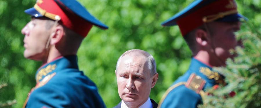 Russian President Vladimir Putin attends a wreath laying ceremony marking the 73rd anniversary of the Soviet Union's victory over Nazi Germany during World War II on May 9, 2018 at the Tomb of the Unknown Soldier by the Kremlin wall in Moscow.