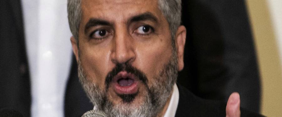 Hamas political leader Khaled Meshaal speaks at political conference on Palestine in Cairo, Egypt, April 4, 2013. 