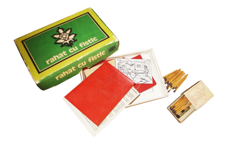 Samizdat cartoons hidden inside a trade union fee book and a box of Turkish delight, and a match box with a tiny book hidden underneath the matches, from Romania, 1980s. 