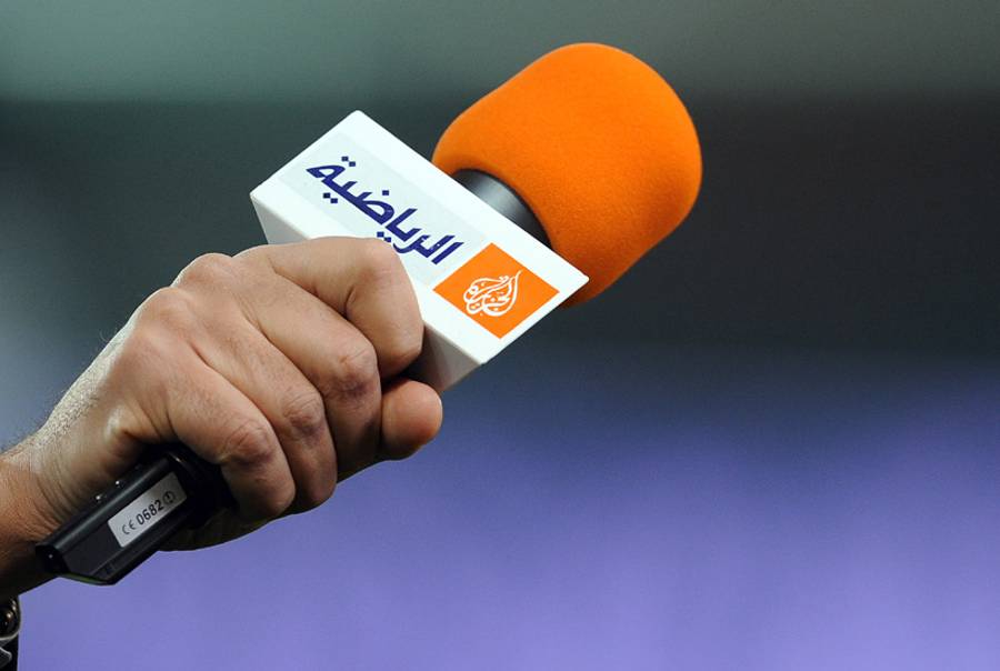A picture taken on March 21, 2012, shows a microphone with the logo of Qatar-based broadcaster Al Jazeera before the French Cup football match Paris vs. Lyon at the Parc des Princes stadium in Paris.(Franck Fife/AFP/Getty Images)
